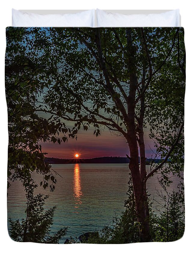 Sunset Duvet Cover featuring the photograph Sunset through the trees by Joe Holley