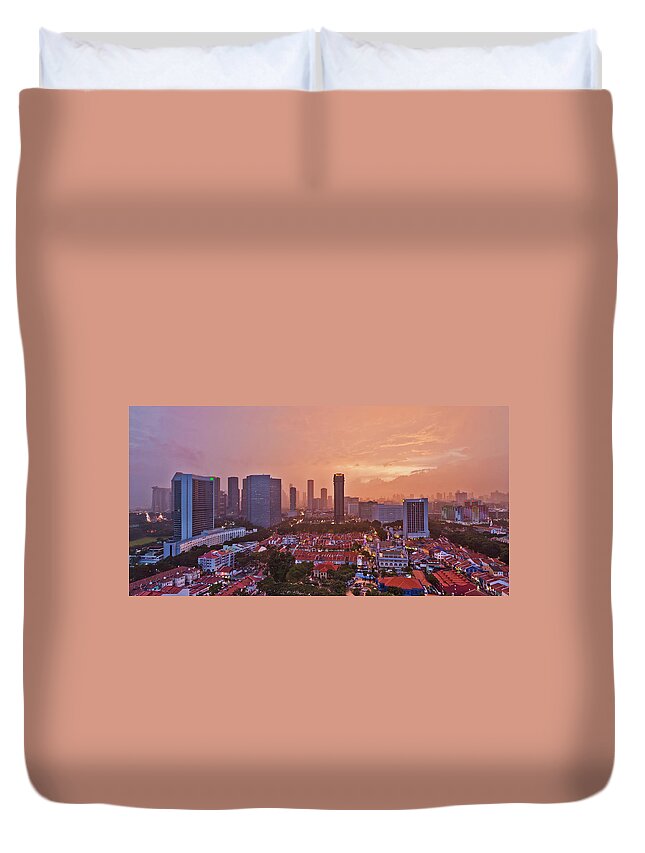 Panoramic Duvet Cover featuring the photograph Sunset With Rain Over City Skyline by Xavier Loh