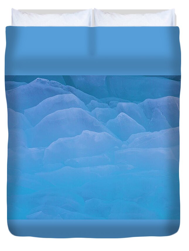 Extreme Terrain Duvet Cover featuring the photograph The Contours Of Ice On The Surface Of by Mint Images - Art Wolfe
