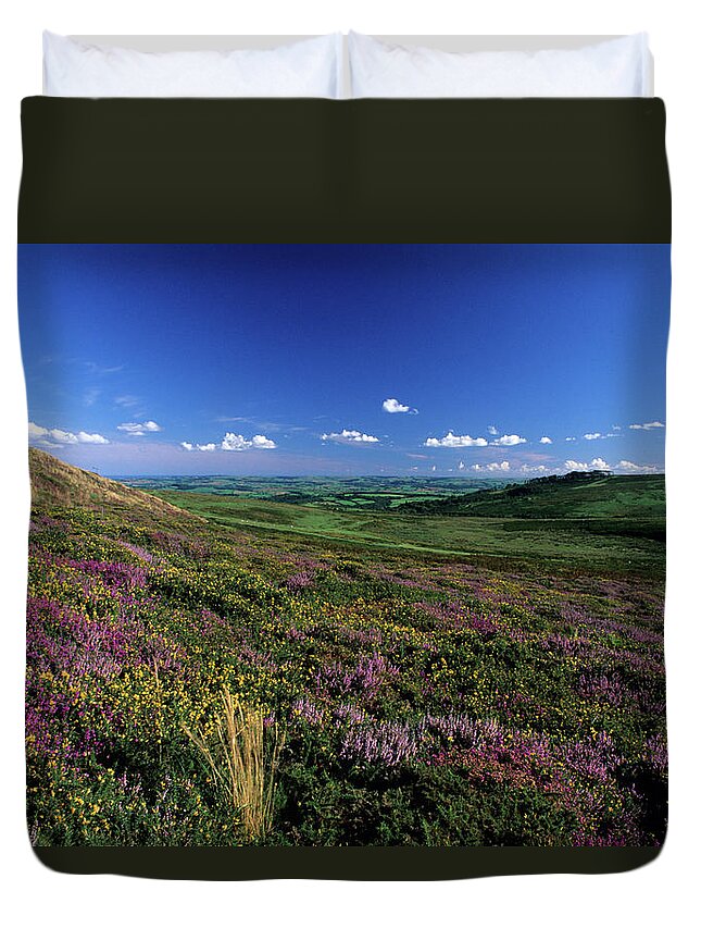 Tranquility Duvet Cover featuring the photograph The Moor In Bloom by David Cayless