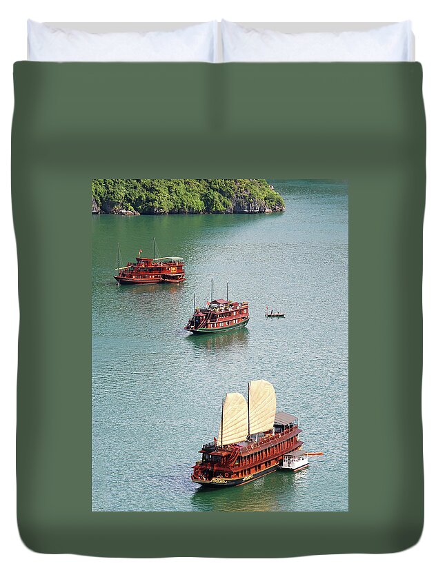 Seascape Duvet Cover featuring the photograph Tourist wooden Boats at Halong Bay Vietnam by Michalakis Ppalis