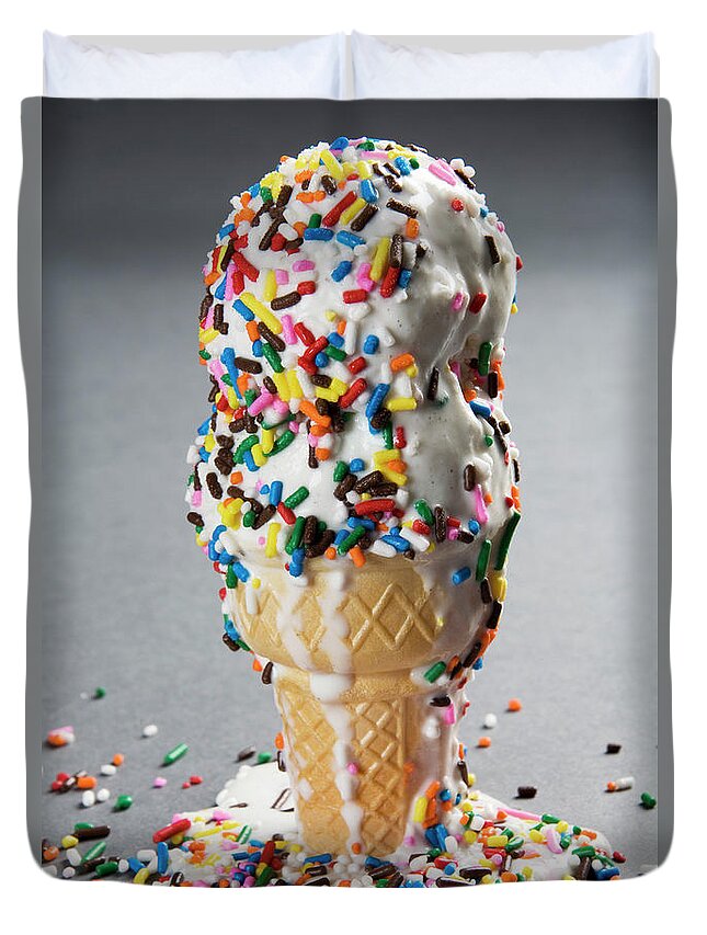 Melting Duvet Cover featuring the photograph Vanilla Ice Cream Cones With Sprinkles by Henry Horenstein