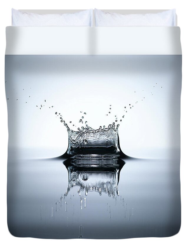 Tranquility Duvet Cover featuring the photograph Water Splash In A Pool Of Water by Chris Stein