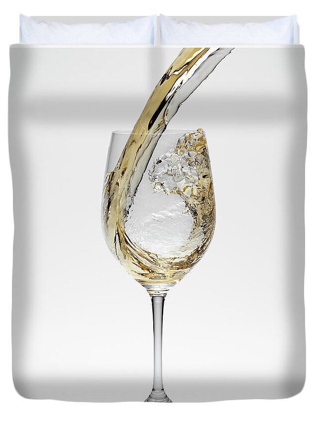 White Background Duvet Cover featuring the photograph White Wine Being Poured Into Wineglass by Don Farrall