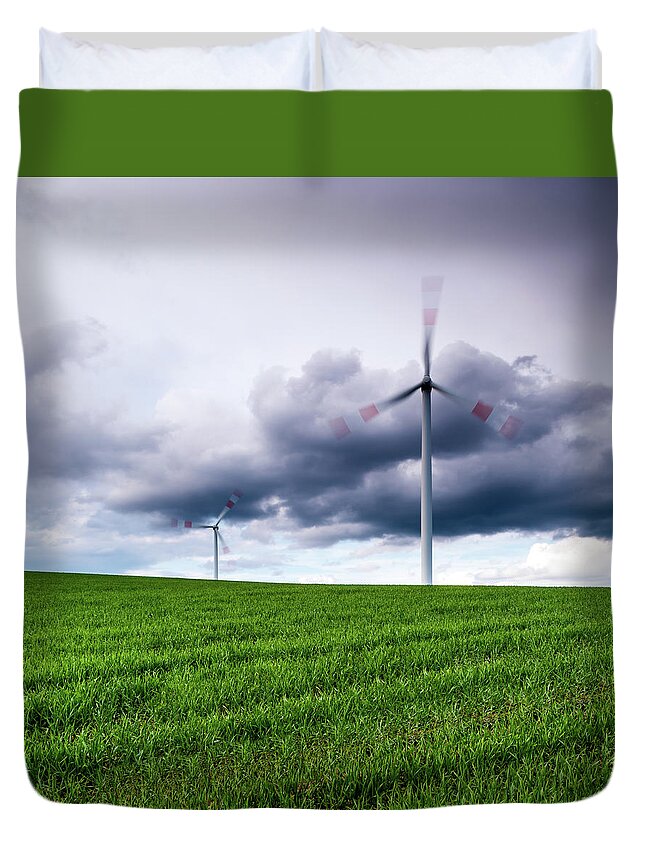 Scenics Duvet Cover featuring the photograph Wind Turbines On A Green Meadow by Mf-guddyx