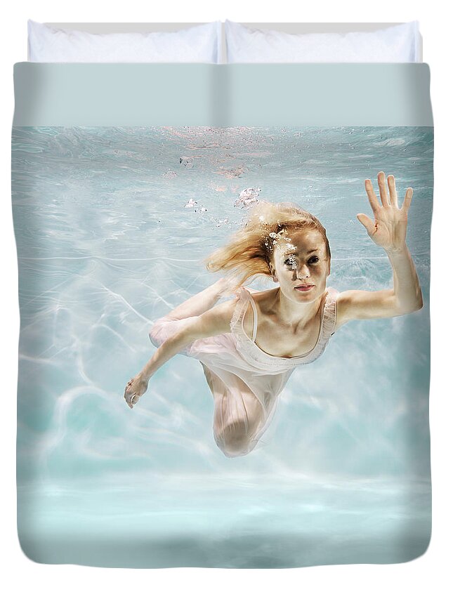 Underwater Duvet Cover featuring the photograph Woman Swimming Underwater by Henrik Sorensen