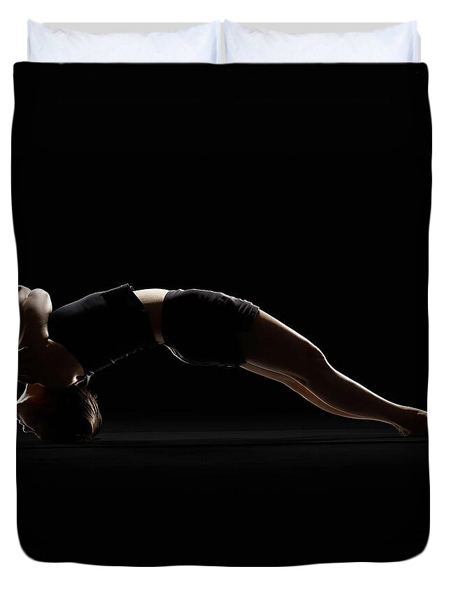 Tranquility Duvet Cover featuring the photograph Women Practicing Yoga In The Bridge by Lewis Mulatero
