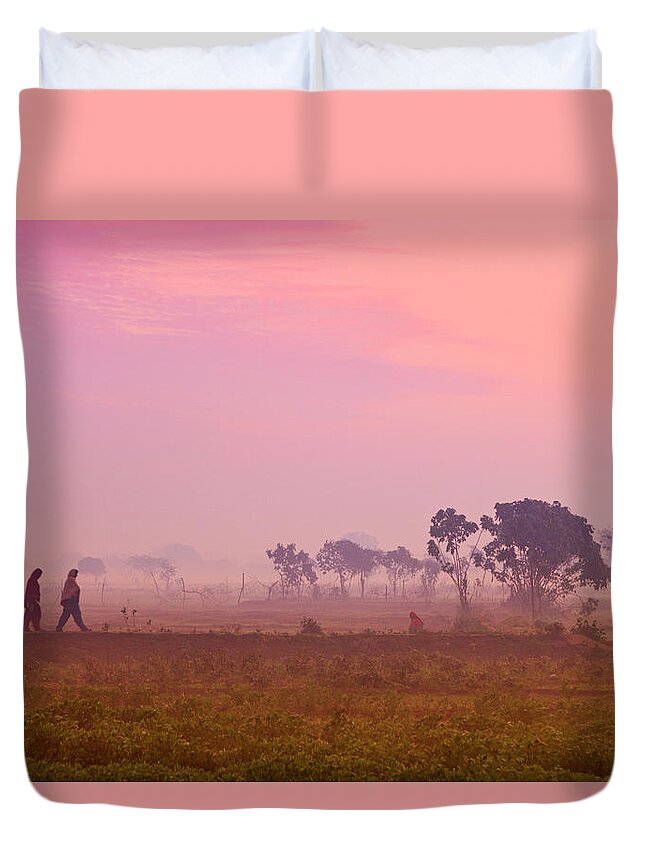 Scenics Duvet Cover featuring the photograph Women Villagers Crossing Field At Dawn by Adrian Pope