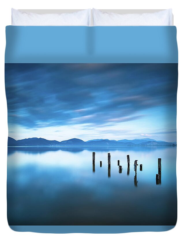 Lake Duvet Cover featuring the photograph Lake and Jetty Remains after Sunset by Stefano Orazzini