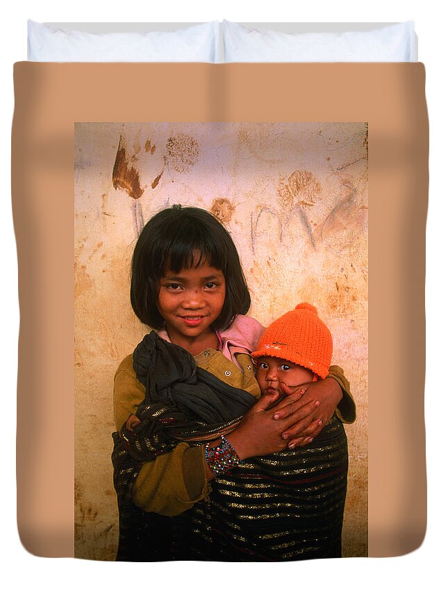Southeast Asia Duvet Cover featuring the photograph Young Koho Child Holding Baby At by John W Banagan