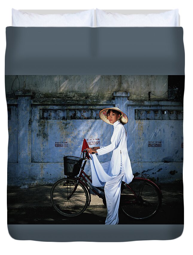 Ho Chi Minh City Duvet Cover featuring the photograph Young Woman Astride Bicycle, Portrait by Buena Vista Images