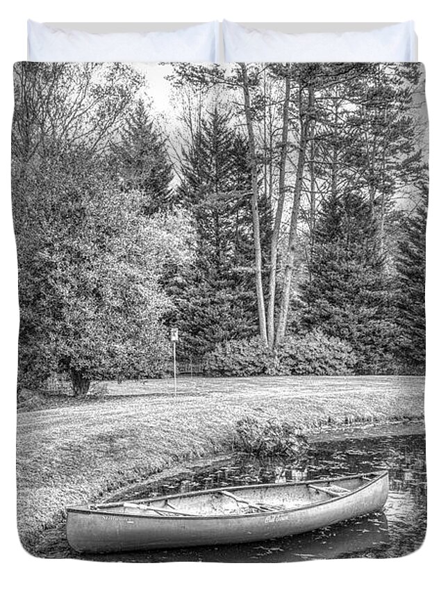 Boats Duvet Cover featuring the photograph Canoe on the Edge of the Lake in Black and White #1 by Debra and Dave Vanderlaan