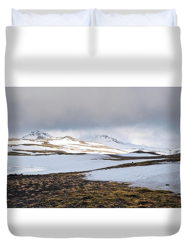 Iceland Duvet Cover featuring the photograph Icelandic landscape with mountains and meadow land covered in snow. Iceland #1 by Michalakis Ppalis