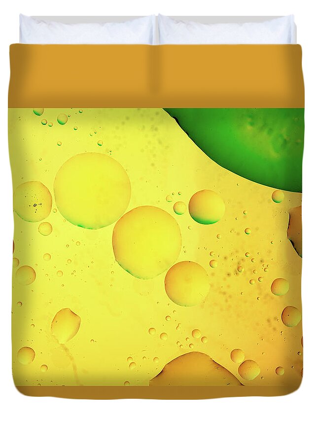 Fluid Duvet Cover featuring the photograph Abstract, image of oil, water and soap with colourful background by Michalakis Ppalis