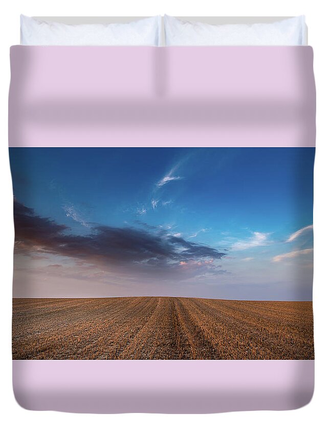 Nightfall Duvet Cover featuring the photograph Agricultural meadow field and cloudy sky during sunset. by Michalakis Ppalis