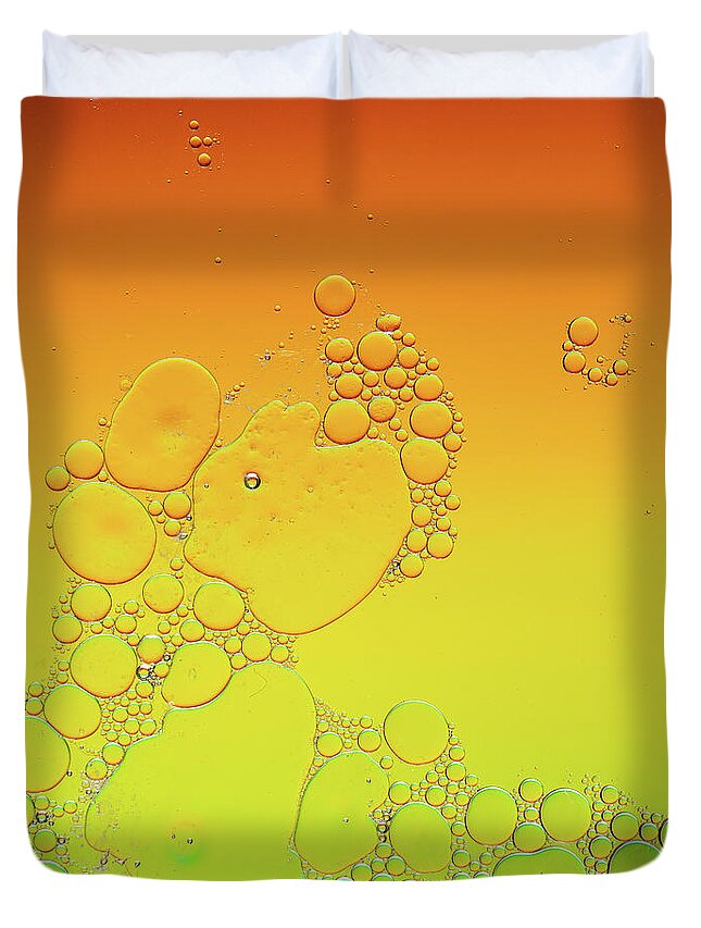 Connection Duvet Cover featuring the photograph Bright abstract, yellow background with flying bubbles by Michalakis Ppalis
