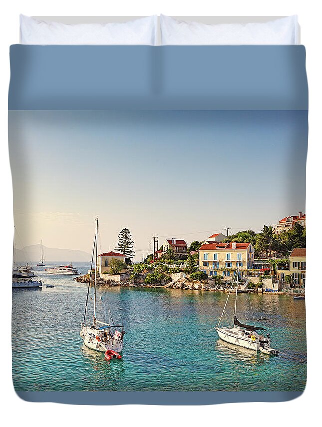Fiscardo Duvet Cover featuring the photograph The port of Fiskardo in Kefalonia, Greece #2 by Constantinos Iliopoulos