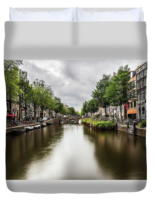 Canal Duvet Cover featuring the photograph Water canal in Amsterdam #3 by Fabiano Di Paolo