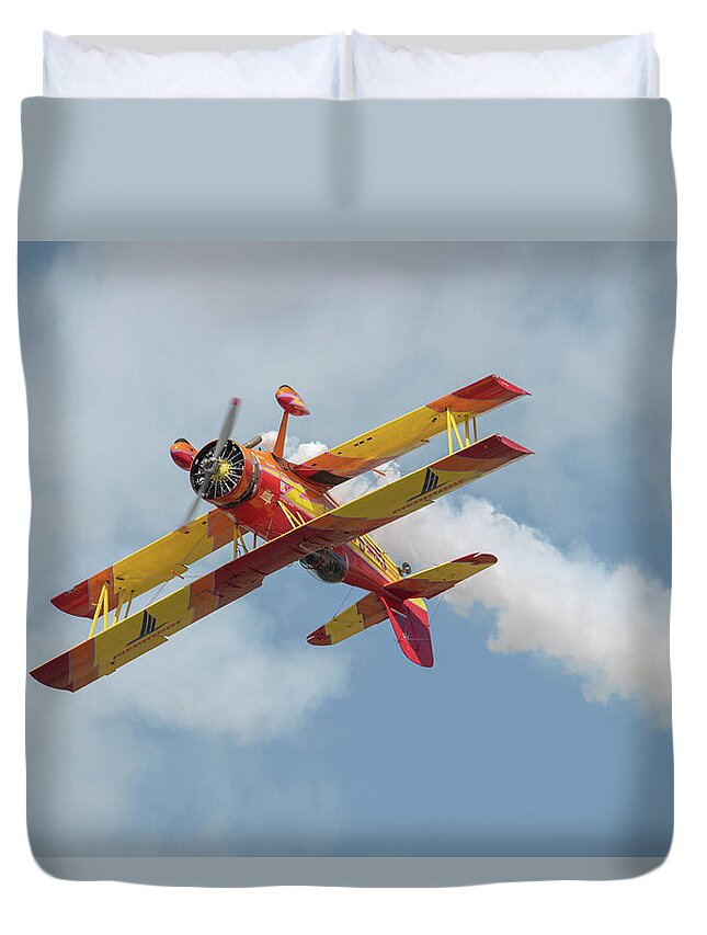 Red Duvet Cover featuring the photograph Red and Yellow Airplane by Carolyn Hutchins