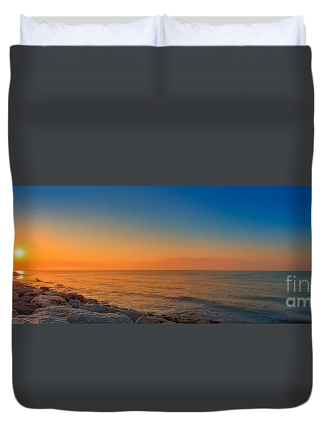 Water Duvet Cover featuring the photograph A beautiful sunset by The P
