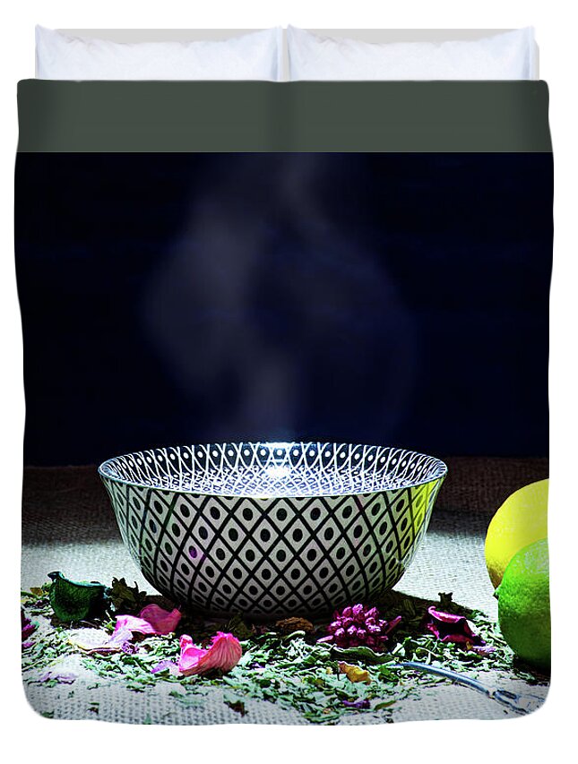 Tea Duvet Cover featuring the photograph A drinking bowl with tea and herbs. by Bernhard Schaffer
