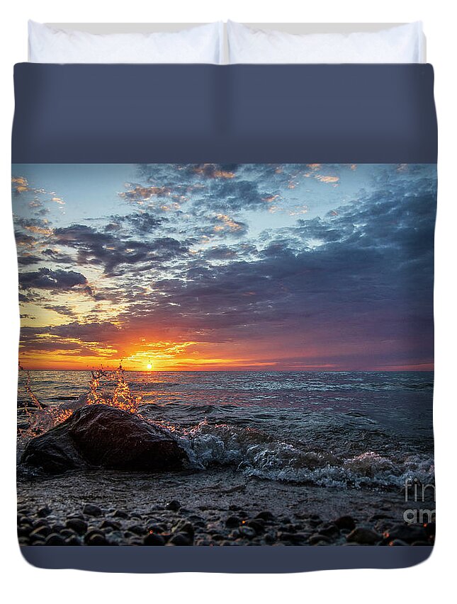 Heart Duvet Cover featuring the photograph A heart shaped splash at sunrise by Eric Curtin
