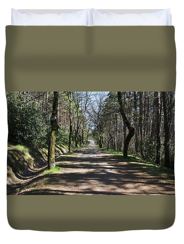 A Wild Ride Duvet Cover featuring the photograph A long way ... by Karine GADRE