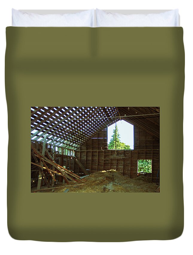 Barn Duvet Cover featuring the photograph A majestic evergreen through the eyes of an old barn by Leslie Struxness