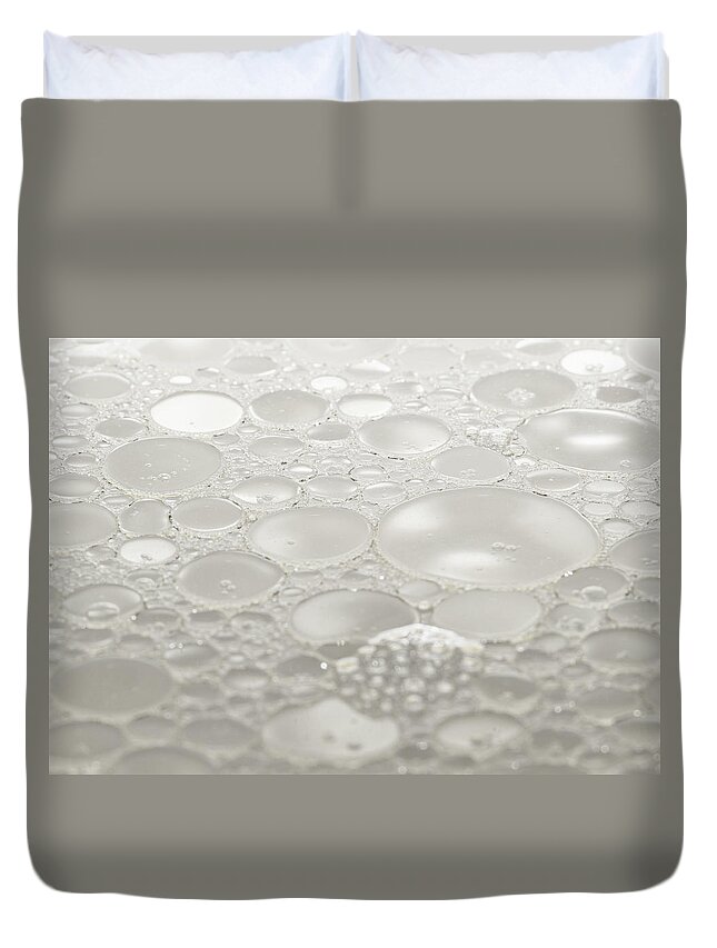 Abstract Photography Duvet Cover featuring the photograph Abstract Photography - Silver Discs by Amelia Pearn