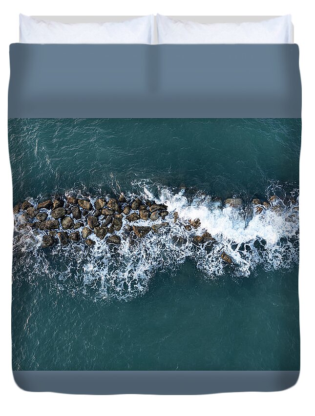 Ocean Duvet Cover featuring the photograph Aerial view from a flying drone of blue sea water and break water. Sea wall coastline by Michalakis Ppalis