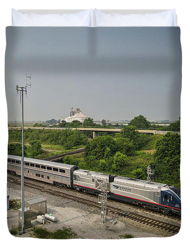 Railroad Duvet Cover featuring the photograph AMTRAK 390 heads north across the diamond at Tuscola IL by Jim Pearson