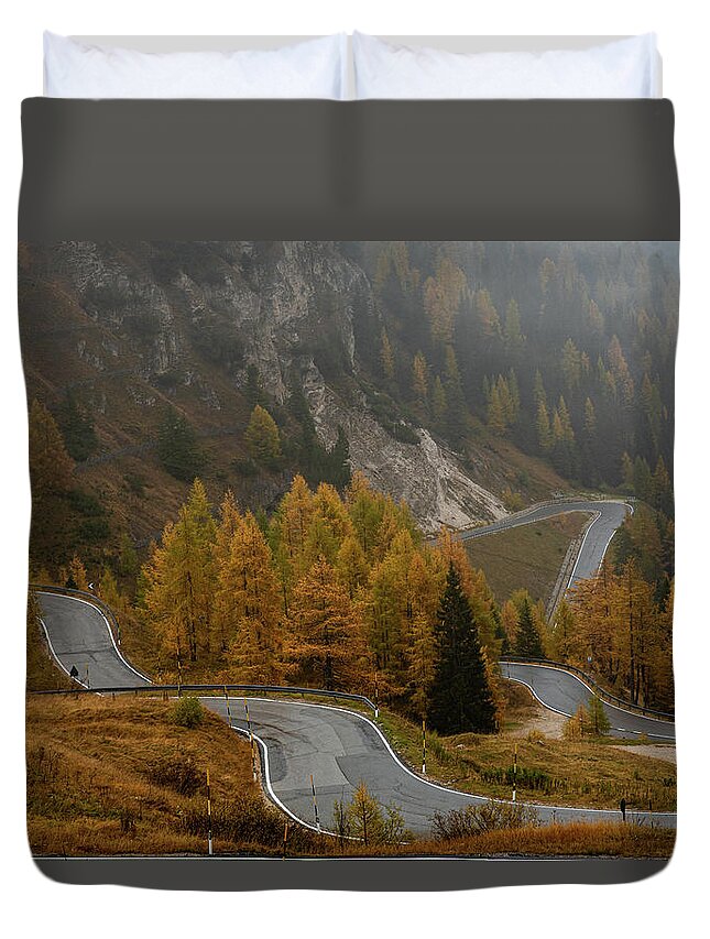 Italian Alps Duvet Cover featuring the photograph Autumn landscape with curved road. Passo di falzarego South Tyrol in Italy by Michalakis Ppalis