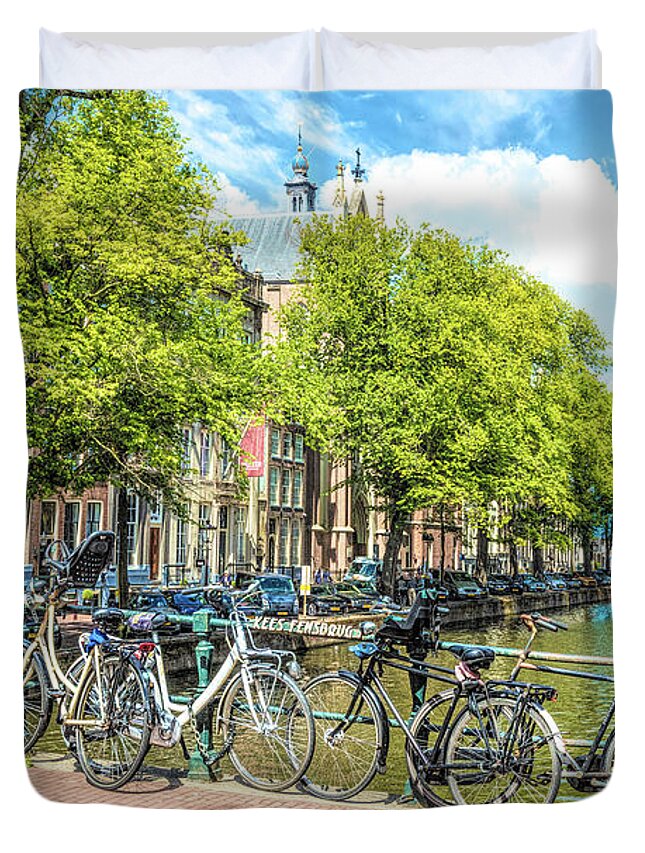 Amsterdam Duvet Cover featuring the photograph Bicycles Along the Canals by Debra and Dave Vanderlaan