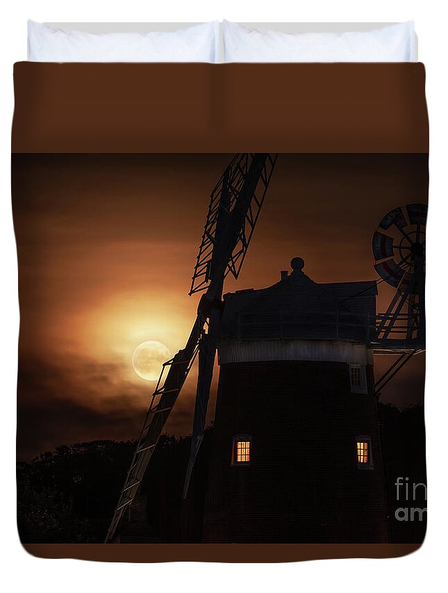 Cley Duvet Cover featuring the photograph Cley windmill and harvest moon at night in Norfolk by Simon Bratt
