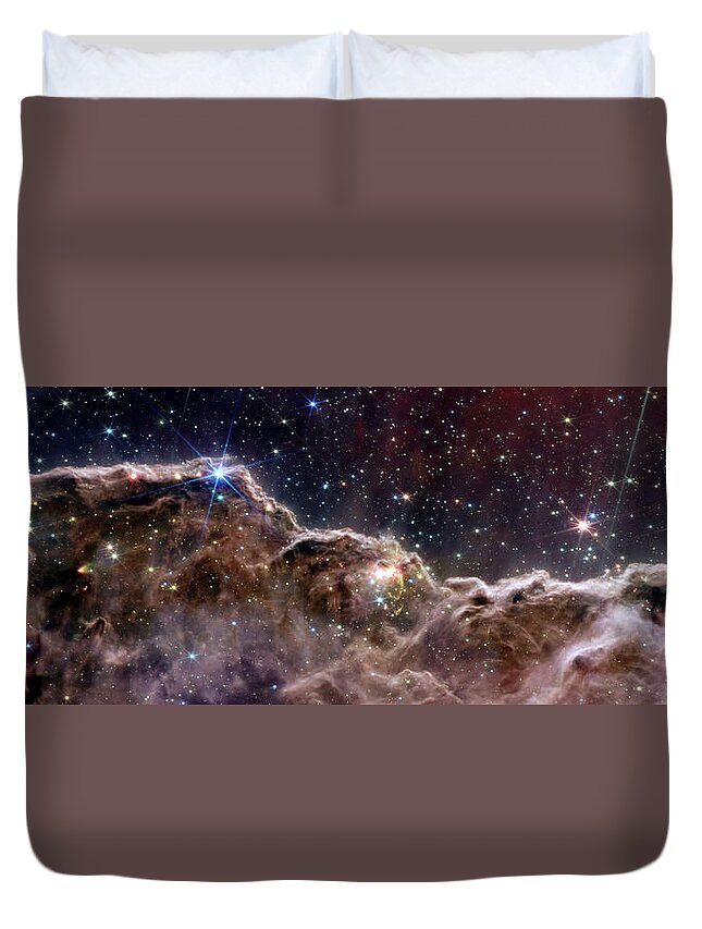 Carina Duvet Cover featuring the photograph 'Cosmic Cliffs' in the Carina Nebula - NIRCam and MIRI Composite Image by Eric Glaser