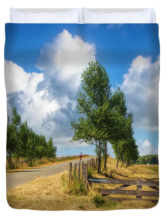 Clouds Duvet Cover featuring the photograph Cycling in the Netherlands by Debra and Dave Vanderlaan