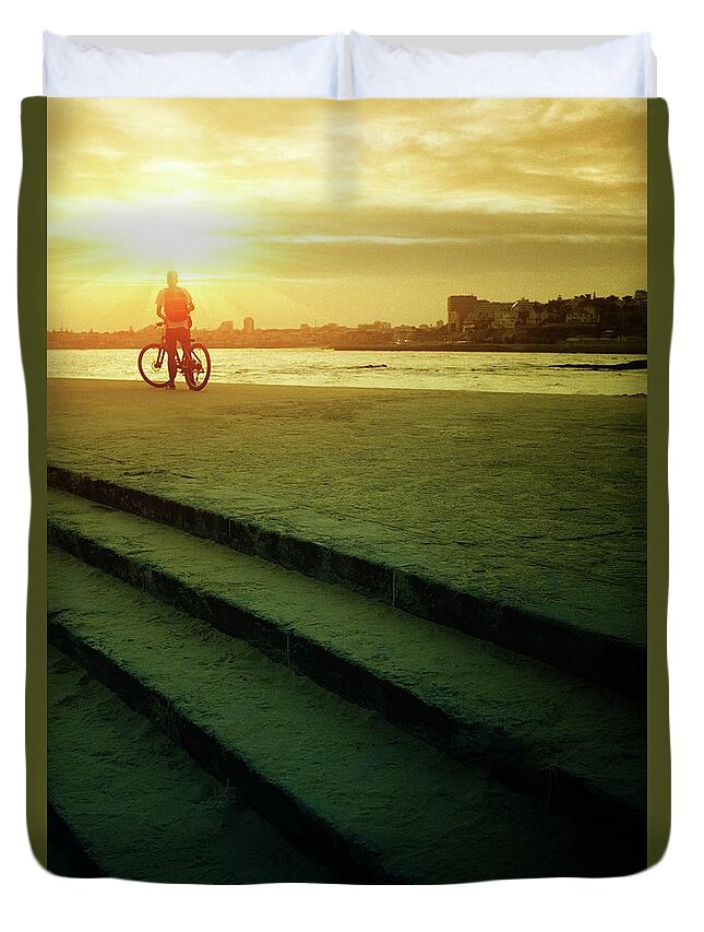 Cyclist Duvet Cover featuring the photograph Cyclist at Sunset by Carlos Caetano