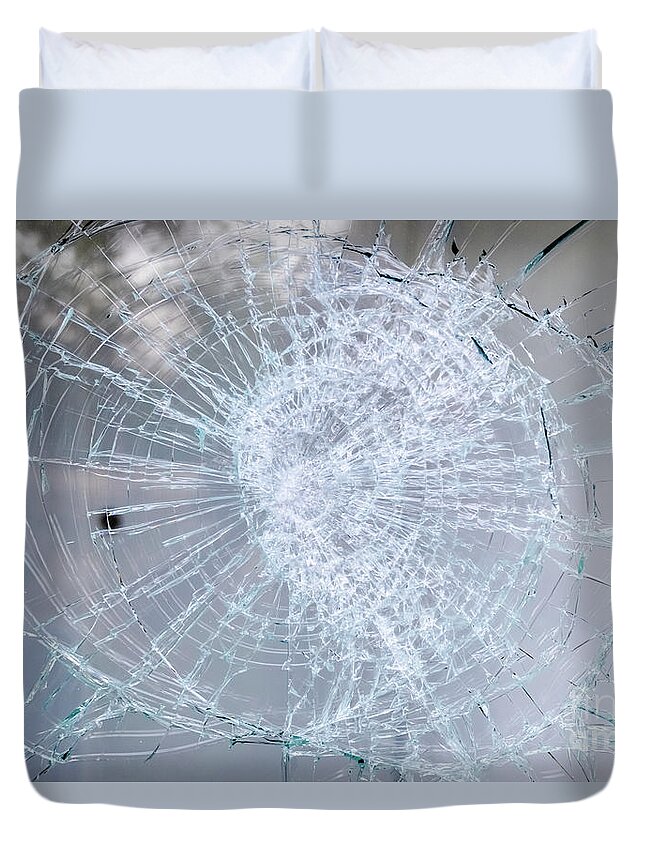 Accident Duvet Cover featuring the photograph Detail of a broken glass of a window. by Joaquin Corbalan