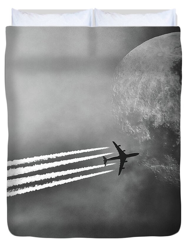 Moon Duvet Cover featuring the photograph Flying Past The Moon by Bob Orsillo