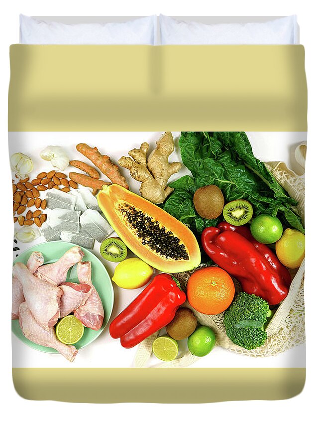 Food Duvet Cover featuring the photograph Foods that boost the Immune System including fruit, vegetables and poultry. by Milleflore Images
