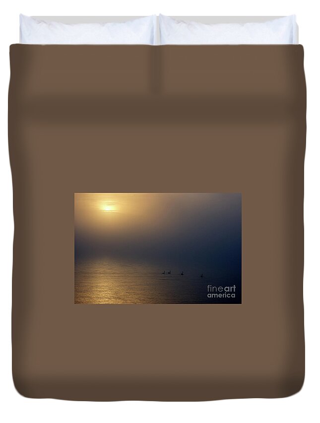 Sunset Duvet Cover featuring the photograph Four swans in sunset by Matteo Del Grosso
