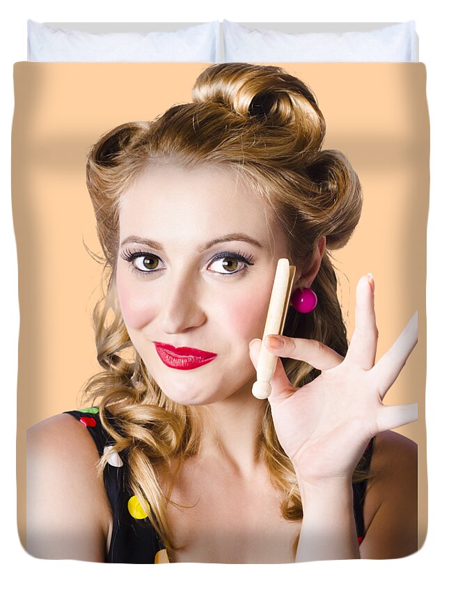 Pin Up Duvet Cover featuring the photograph Happy woman with clothes peg by Jorgo Photography