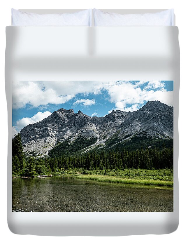 River Duvet Cover featuring the photograph headwaters of the Elbow River by Karen Rispin