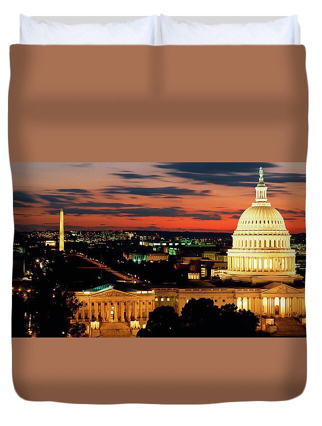 18th Century Style Building Exterior Building Structure Capitol Building City City Location Cloud Color Image Dome Dusk Federal Building High Angle View Horizontal House Of Representatives Illuminated International Landmark Legislative Building Monument Nobody North America Obelisk Outdoors Panoramic Photography Senate Sky Twilight Urban Scene Usa Washington Dc Washington Monument American Culture Architecture Authority Capital Cities Government Travel Destinations Duvet Cover featuring the photograph High angle view of a city lit up at dusk, Washington DC, USA by Panoramic Images