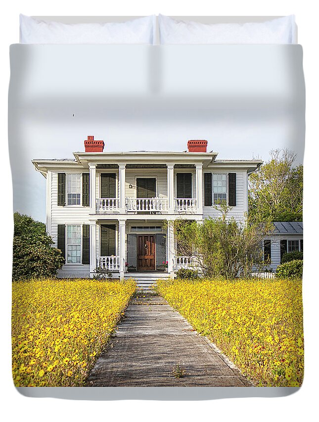 Beaufort Duvet Cover featuring the photograph HIstoric Home With Yard of Wildflowers - Beaufort North Carolina by Bob Decker