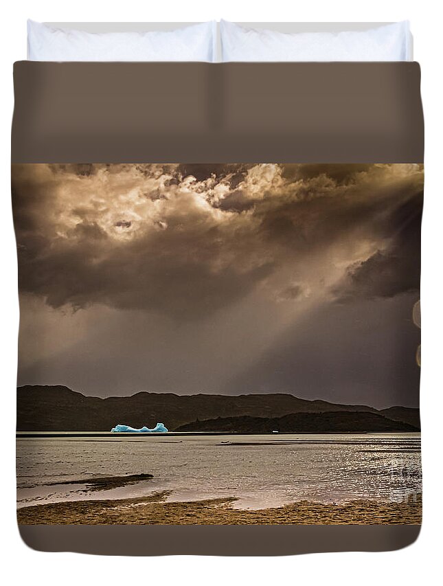 Iceberg Duvet Cover featuring the photograph Iceberg lit by the sun on Lago Grey by Lyl Dil Creations