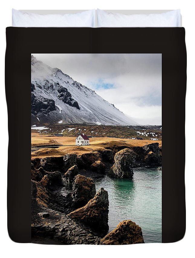 Arnarstapi Duvet Cover featuring the photograph Iceland landscape in winter at Arnarstapi village. by Michalakis Ppalis