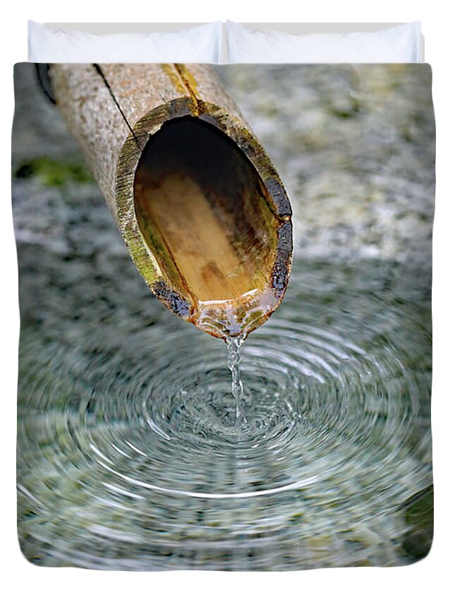 Water Fountain; Fountain; Japanese Fountain; Japanese Garden; Zen; Water; Drip; Droplets; Bamboo; Pool; Stone; Pebbles; Green; Duvet Cover featuring the photograph In a Japanese Garden by Tina Uihlein