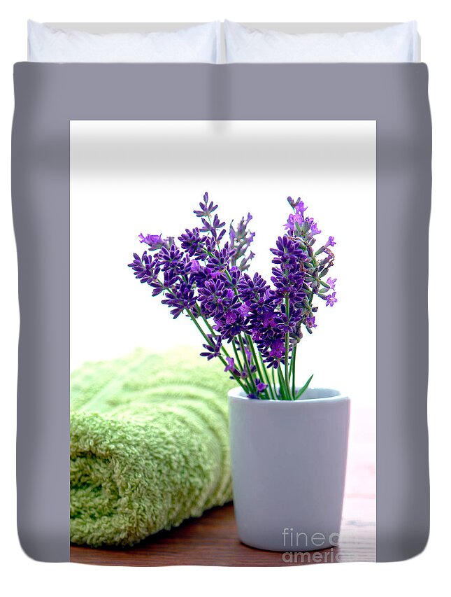 Aromatherapy Duvet Cover featuring the photograph Lavender Flowers and Bath Towel in a Spa by Olivier Le Queinec