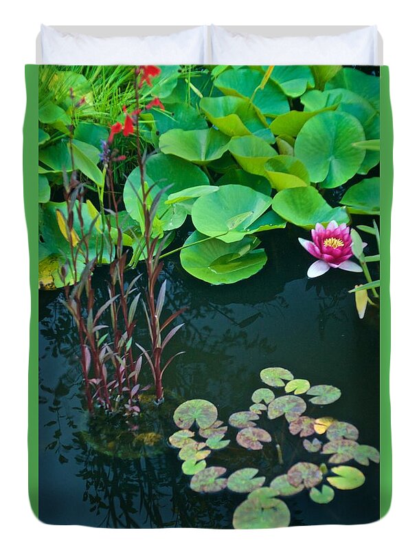 Lily Pads Duvet Cover featuring the photograph Lily Pad Roll by Richard Cummings
